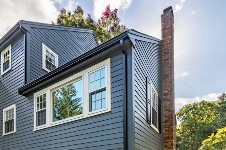 Hardie® siding featuring the 2025 Color of the Year, Evening Blue, with factory-applied, baked-on ColorPlus® finish for superior color consistency, adhesion, and long-lasting durability